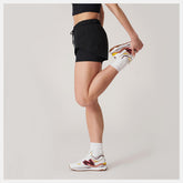 Bandier Woven tech Short / New Balance Women