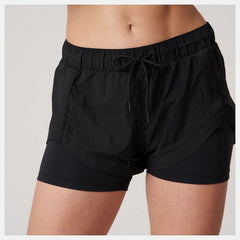 Bandier Woven tech Short / New Balance Women