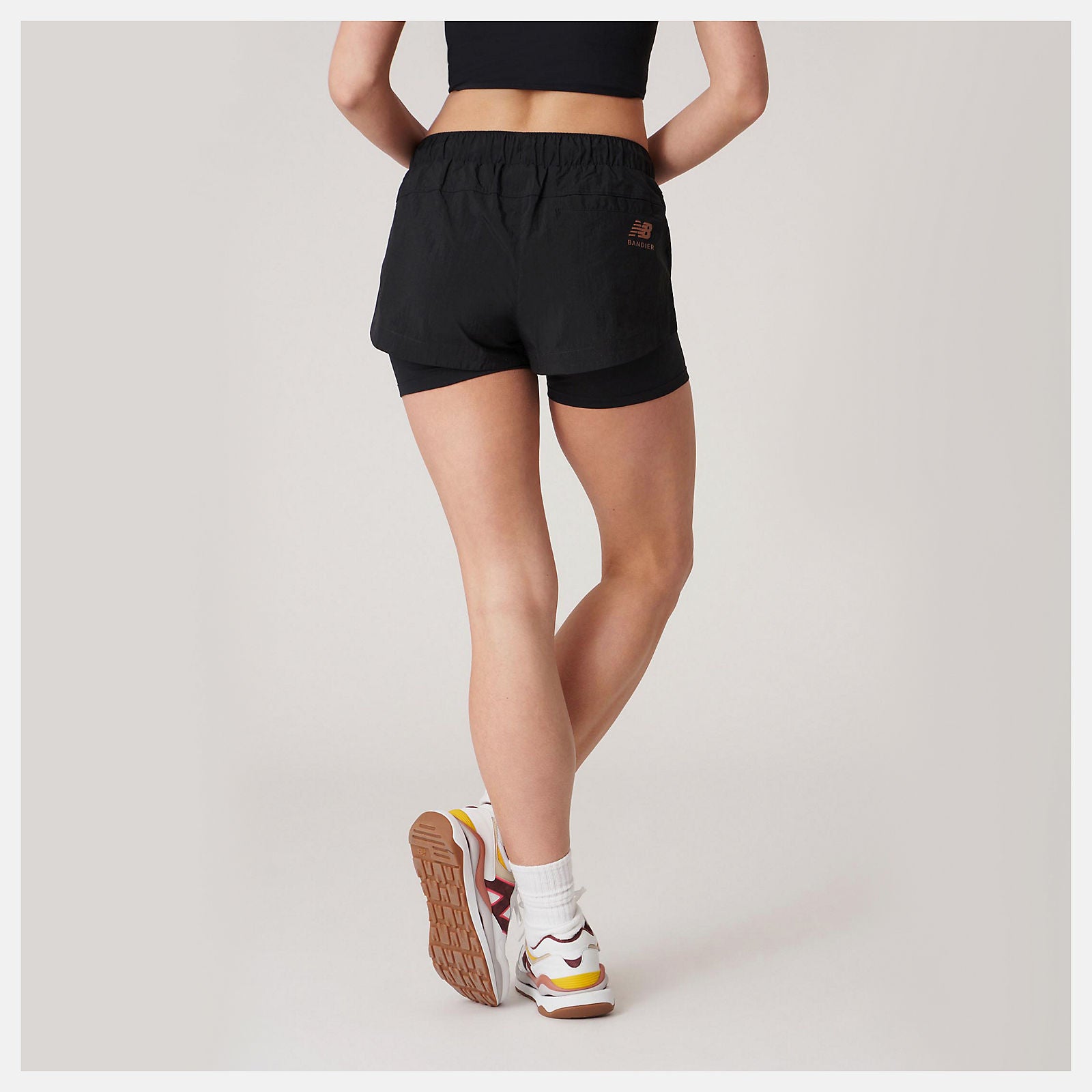 Bandier Woven tech Short / New Balance Women